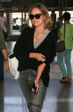OLIVIA WILDE and Jason Sudekis at LAX Airport in Los Angeles 09/27/2018