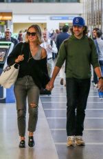OLIVIA WILDE and Jason Sudekis at LAX Airport in Los Angeles 09/27/2018