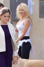 PAMELA ANDERSON Leaves Her Hotel in Paris 09/14/2018
