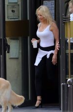 PAMELA ANDERSON Leaves Her Hotel in Paris 09/14/2018