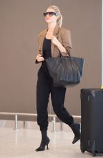ROSIE HUNTINGTON-WHITELEY at JFK Airport in New York 09/11/2018