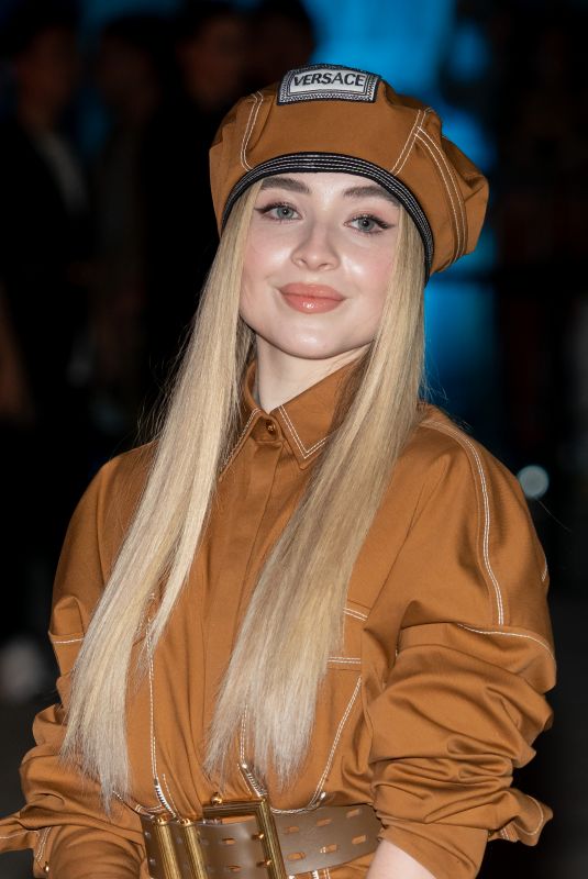 SABRINA CARPENTER Arrives at Versace Show at Milan Fashion Week 09/21/2018