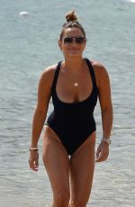 SAM FAIERS in Swimsuit at a Beach in Sardinia 09/11/2018