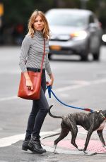 SIENNA MILLER Walks Her Dog Out in New York 09/21/2018