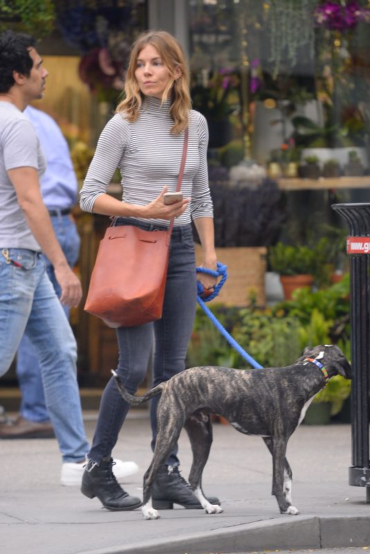 SIENNA MILLER Walks Her Dog Out in New York 09/21/2018