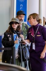 WINON ARYDER and Scott MacKinlay Hahn at LAX Airport in Los Angeles 09/21/2018