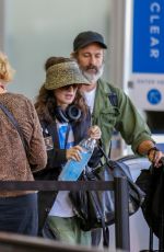 WINON ARYDER and Scott MacKinlay Hahn at LAX Airport in Los Angeles 09/21/2018