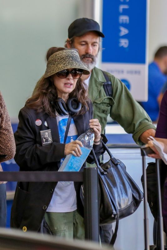 WINON ARYDER and Scott MacKinlay Hahn at LAX Airport in Los Angeles 09/21/2018