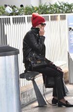 ASHLEY BENSON at LAX Airport in Los Angeles 10/05/2018