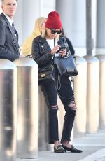 ASHLEY BENSON at LAX Airport in Los Angeles 10/05/2018