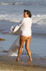 CHRISSY TEIGEN on the Set of a Photoshoot at a Beach in Malibu 10/09/2018