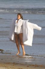 CHRISSY TEIGEN on the Set of a Photoshoot at a Beach in Malibu 10/09/2018