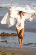 CHRISSY TEIGEN on the Set of a Photoshoot at a Beach in Malibu 10/09/2018