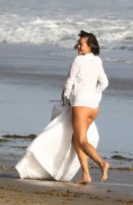 CHRISSY TEIGEN on the Set of a Photoshoot at a Beach in Malibu 10/09/2018