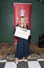 DAKOTA FANNING at International Day of Girl in Los Angeles 10/11/2018