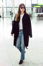 DAKOTA JOHNSON at Heathrow Airport in London 10/17/2018
