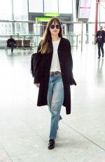 DAKOTA JOHNSON at Heathrow Airport in London 10/17/2018