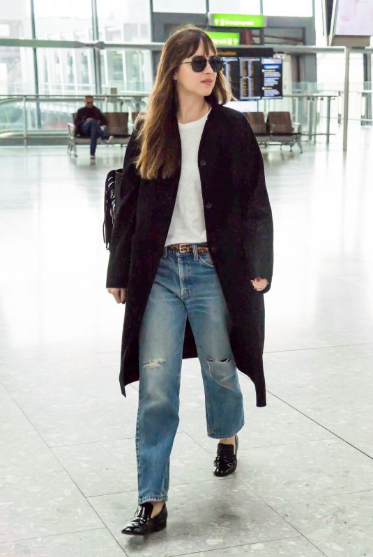 DAKOTA JOHNSON at Heathrow Airport in London 10/17/2018