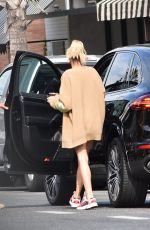 HAILEY BALDWIN Leaves Joan