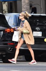 HAILEY BALDWIN Leaves Joan