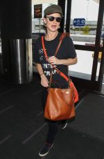 JULIETTE LEWIS at LAX Airport in Los Angeles 10/19/2018