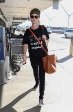 JULIETTE LEWIS at LAX Airport in Los Angeles 10/19/2018