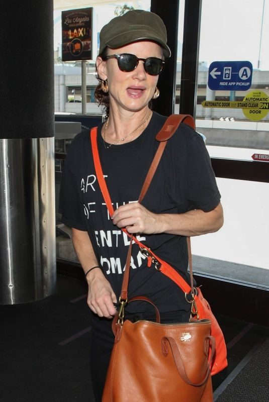 JULIETTE LEWIS at LAX Airport in Los Angeles 10/19/2018