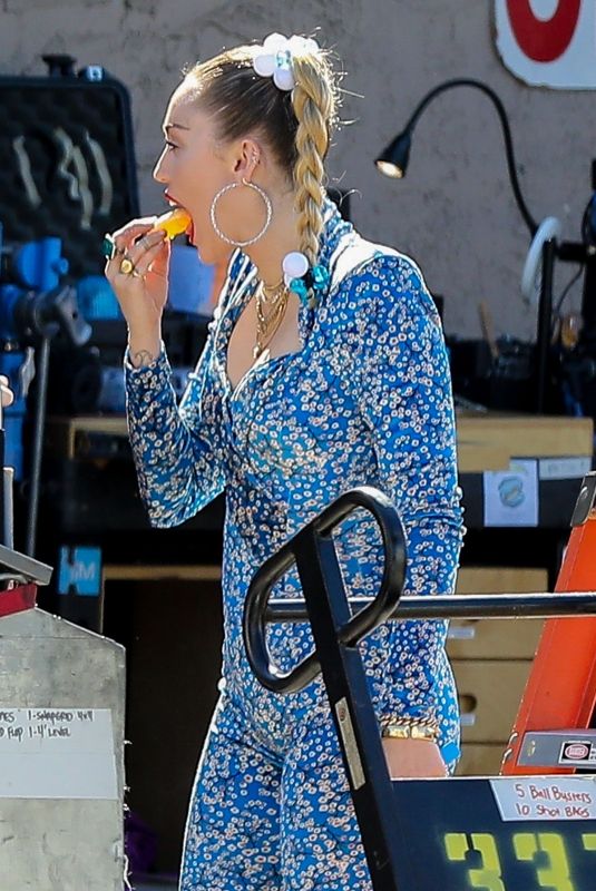 MILEY CYRUS in a Jumpsuit on the Set of Her Latest Project in Los Angeles 10/18/2018