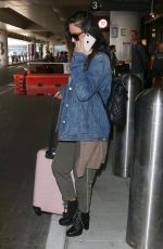 OLIVIA MUNN at LAX Airport in Los Angeles 10/09/2018