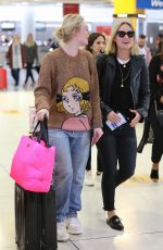 OLIVIA WILDE and ELLE FANNING at JFK Airport in New York 10/01/2018
