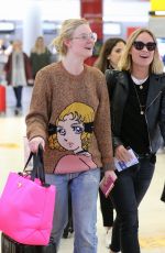 OLIVIA WILDE and ELLE FANNING at JFK Airport in New York 10/01/2018