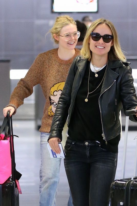 OLIVIA WILDE and ELLE FANNING at JFK Airport in New York 10/01/2018
