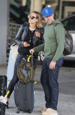 OLIVIA WILDE and Jason Sudeikis at JFK Airport in New York 10/01/2018
