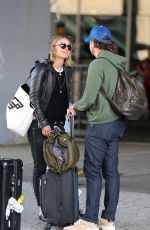OLIVIA WILDE and Jason Sudeikis at JFK Airport in New York 10/01/2018
