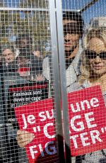 PAMELA ANDERSON Protests Breeding of Animals in Cages in Paris 10/10/2018