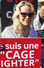 PAMELA ANDERSON Protests Breeding of Animals in Cages in Paris 10/10/2018