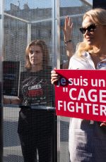 PAMELA ANDERSON Protests Breeding of Animals in Cages in Paris 10/10/2018