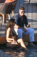 Pregnant APRIL LOVE GEARY in Bikini at a Photoshoot in St. Barts 10/26/2018
