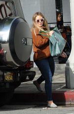 Pregnant HILARY DUFF at Joan