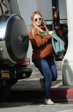 Pregnant HILARY DUFF at Joan