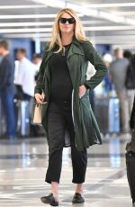 Pregnant KATE UPTON at LAX Airport in Los Angeles 09/30/2018