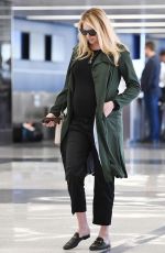 Pregnant KATE UPTON at LAX Airport in Los Angeles 09/30/2018