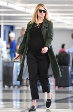 Pregnant KATE UPTON at LAX Airport in Los Angeles 09/30/2018