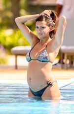 Pregnant TYLA CARR in Bikini at a Pool in Dubai 10/17/2018