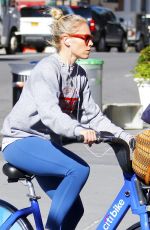 SIENNA MILLER Out Riding a Bike in Bew York 10/12/2018