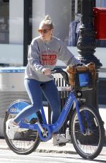 SIENNA MILLER Out Riding a Bike in Bew York 10/12/2018