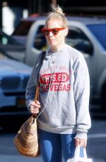 SIENNA MILLER Out Riding a Bike in Bew York 10/12/2018