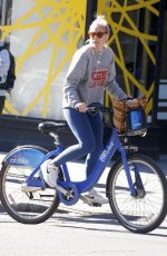 SIENNA MILLER Out Riding a Bike in Bew York 10/12/2018