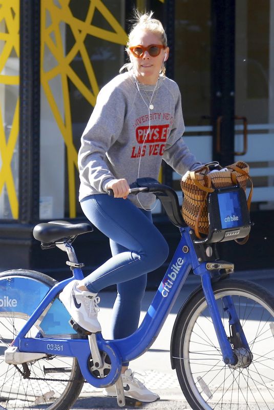 SIENNA MILLER Out Riding a Bike in Bew York 10/12/2018