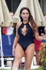 SOPHIE KASAEI in Swimsuit at a Pool in Tenerife 09/30/2018